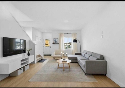 21 Cornerbrook Lane Ne, Calgary, AB - Indoor Photo Showing Living Room