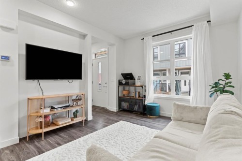 1402-100 Walgrove Court Se, Calgary, AB - Indoor Photo Showing Living Room