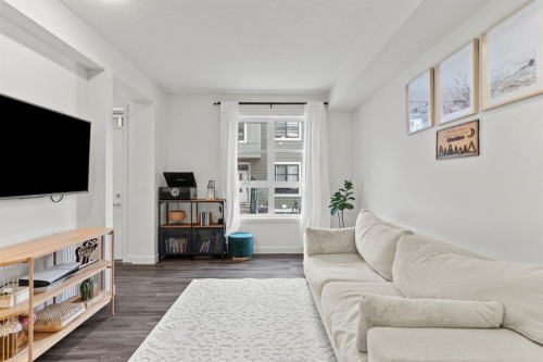 1402-100 Walgrove Court Se, Calgary, AB - Indoor Photo Showing Living Room