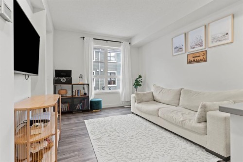 1402-100 Walgrove Court Se, Calgary, AB - Indoor Photo Showing Living Room