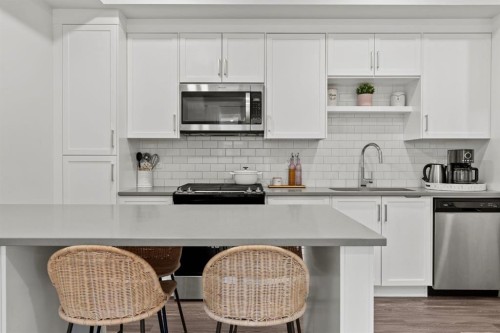 1402-100 Walgrove Court Se, Calgary, AB - Indoor Photo Showing Kitchen With Stainless Steel Kitchen With Upgraded Kitchen