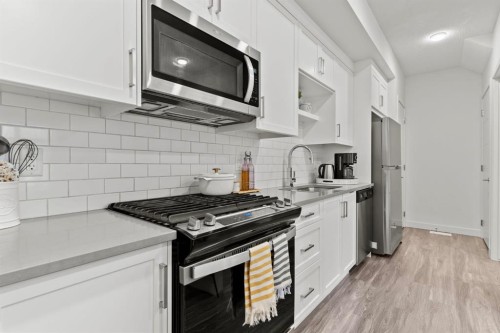 1402-100 Walgrove Court Se, Calgary, AB - Indoor Photo Showing Kitchen With Stainless Steel Kitchen With Upgraded Kitchen