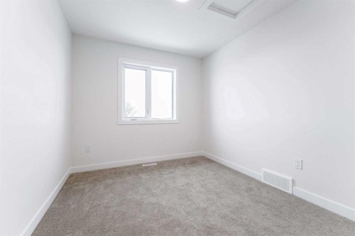 1921 Mccaskill Drive, Crossfield, AB - Indoor Photo Showing Other Room