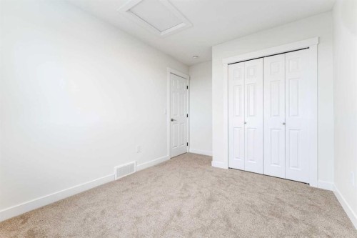 1921 Mccaskill Drive, Crossfield, AB - Indoor Photo Showing Other Room