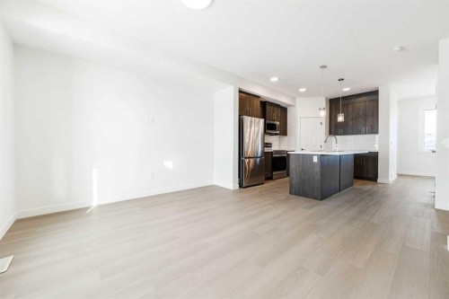 1921 Mccaskill Drive, Crossfield, AB - Indoor Photo Showing Kitchen