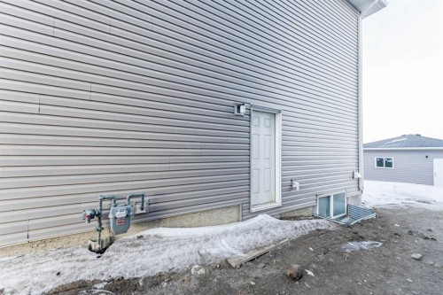 1921 Mccaskill Drive, Crossfield, AB - Outdoor With Exterior