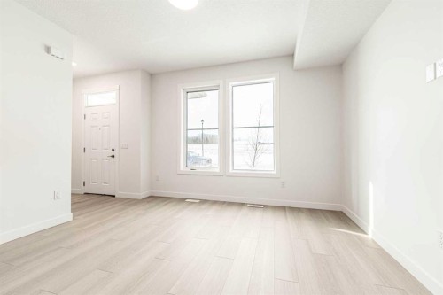 1921 Mccaskill Drive, Crossfield, AB - Indoor Photo Showing Other Room
