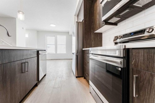 1921 Mccaskill Drive, Crossfield, AB - Indoor Photo Showing Kitchen