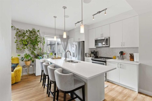95 Sage Bluff Gate Nw, Calgary, AB - Indoor Photo Showing Kitchen With Stainless Steel Kitchen With Double Sink With Upgraded Kitchen