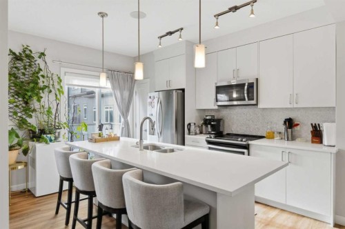 95 Sage Bluff Gate Nw, Calgary, AB - Indoor Photo Showing Kitchen With Stainless Steel Kitchen With Double Sink With Upgraded Kitchen