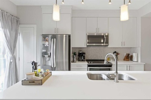 95 Sage Bluff Gate Nw, Calgary, AB - Indoor Photo Showing Kitchen With Stainless Steel Kitchen With Double Sink With Upgraded Kitchen