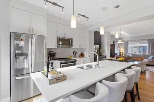 95 Sage Bluff Gate Nw, Calgary, AB - Indoor Photo Showing Kitchen With Stainless Steel Kitchen With Double Sink With Upgraded Kitchen