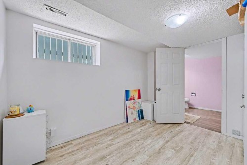 29 Erin Green Way Se, Calgary, AB - Indoor Photo Showing Other Room
