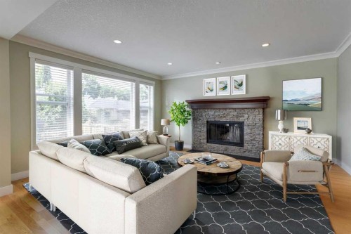 417 29 Avenue Nw, Calgary, AB - Indoor Photo Showing Living Room With Fireplace