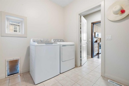47 Copperstone Mews Se, Calgary, AB - Indoor Photo Showing Laundry Room