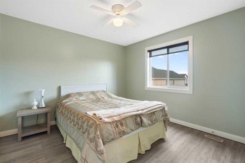 47 Copperstone Mews Se, Calgary, AB - Indoor Photo Showing Bedroom