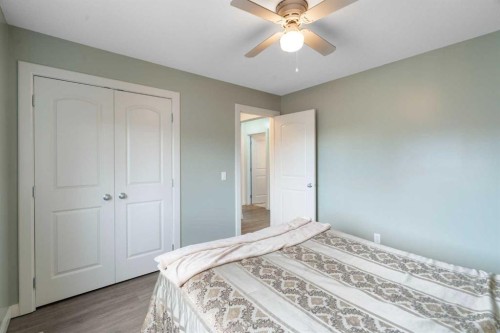 47 Copperstone Mews Se, Calgary, AB - Indoor Photo Showing Bedroom