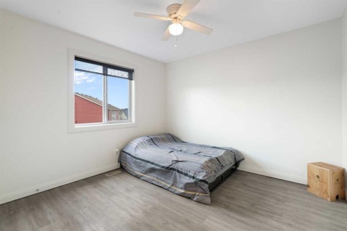 47 Copperstone Mews Se, Calgary, AB - Indoor Photo Showing Bedroom