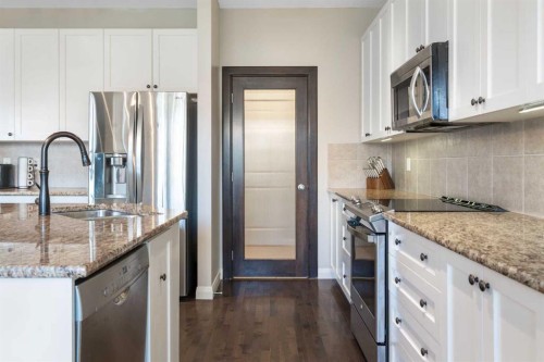 47 Copperstone Mews Se, Calgary, AB - Indoor Photo Showing Kitchen With Stainless Steel Kitchen With Double Sink With Upgraded Kitchen