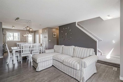 313 Copperpond Landing Se, Calgary, AB - Indoor Photo Showing Living Room
