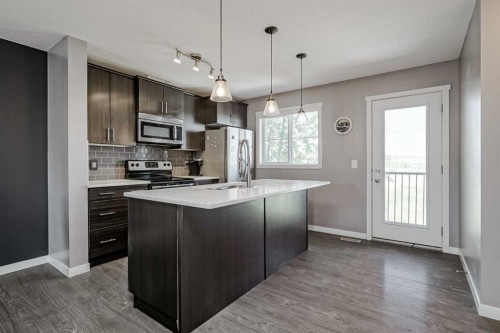 313 Copperpond Landing Se, Calgary, AB - Indoor Photo Showing Kitchen With Upgraded Kitchen