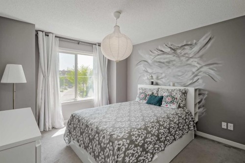 313 Copperpond Landing Se, Calgary, AB - Indoor Photo Showing Bedroom