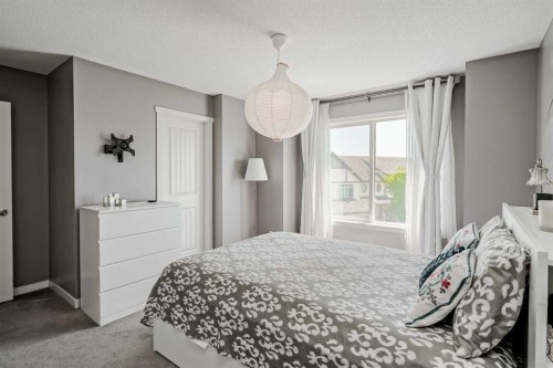 313 Copperpond Landing Se, Calgary, AB - Indoor Photo Showing Bedroom