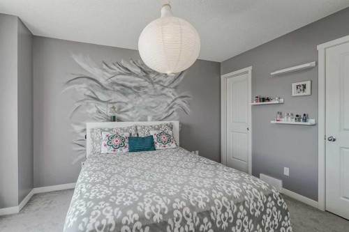 313 Copperpond Landing Se, Calgary, AB - Indoor Photo Showing Bedroom