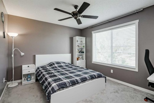 313 Copperpond Landing Se, Calgary, AB - Indoor Photo Showing Bedroom