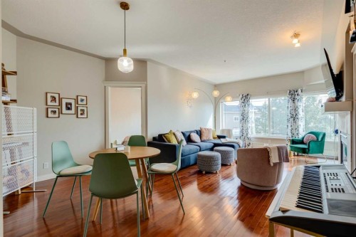 534-10 Discovery Ridge Close Sw, Calgary, AB - Indoor Photo Showing Living Room With Fireplace