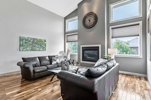 73 Evanspark Way Nw, Calgary, AB - Indoor Photo Showing Living Room With Fireplace