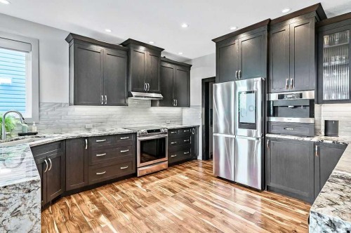 73 Evanspark Way Nw, Calgary, AB - Indoor Photo Showing Kitchen With Upgraded Kitchen