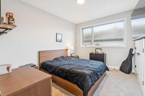1636 Acton Avenue Sw, Calgary, AB - Indoor Photo Showing Bedroom
