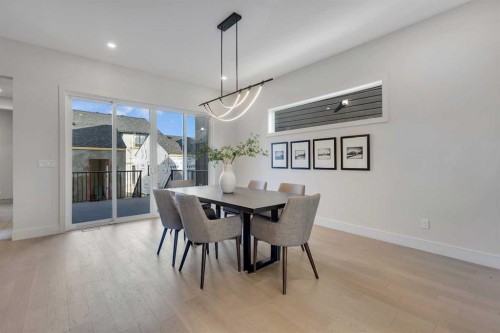 336 Normandy Drive Sw, Calgary, AB - Indoor Photo Showing Dining Room