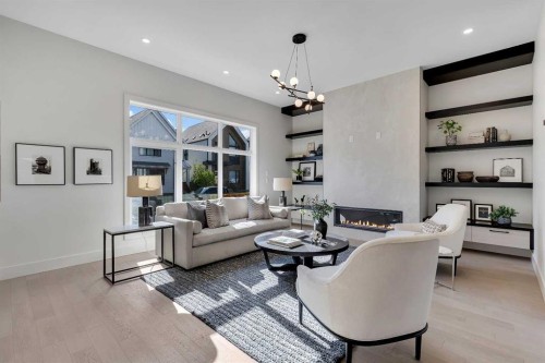 336 Normandy Drive Sw, Calgary, AB - Indoor Photo Showing Living Room
