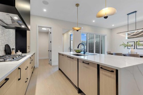 336 Normandy Drive Sw, Calgary, AB - Indoor Photo Showing Kitchen