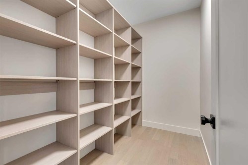 336 Normandy Drive Sw, Calgary, AB - Indoor With Storage