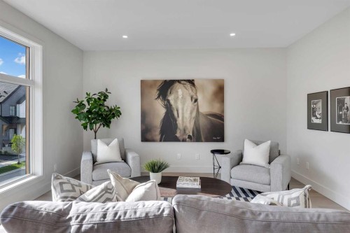 336 Normandy Drive Sw, Calgary, AB - Indoor Photo Showing Living Room