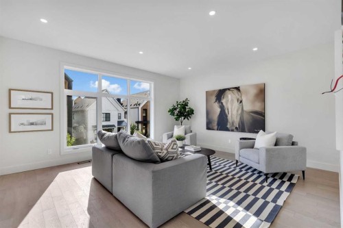 336 Normandy Drive Sw, Calgary, AB - Indoor Photo Showing Living Room