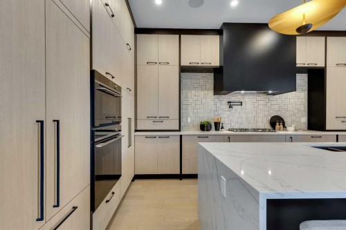 336 Normandy Drive Sw, Calgary, AB - Indoor Photo Showing Kitchen With Upgraded Kitchen