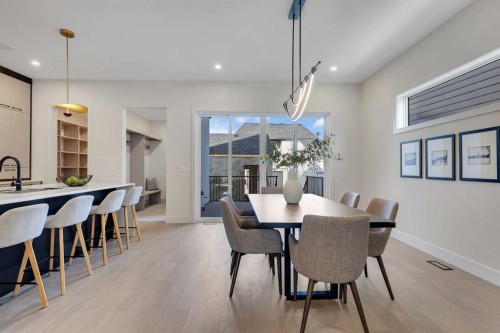 336 Normandy Drive Sw, Calgary, AB - Indoor Photo Showing Dining Room