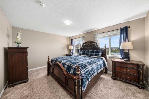 353 Windrow Crescent Sw, Airdrie, AB - Indoor Photo Showing Bedroom