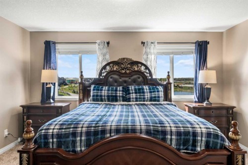 353 Windrow Crescent Sw, Airdrie, AB - Indoor Photo Showing Bedroom
