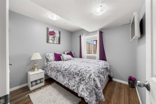 353 Windrow Crescent Sw, Airdrie, AB - Indoor Photo Showing Bedroom