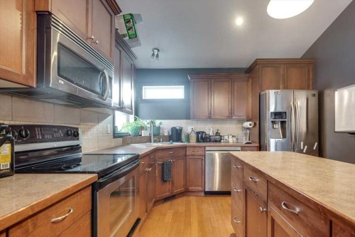 114 Jenner Crescent, Red Deer, AB - Indoor Photo Showing Kitchen With Double Sink