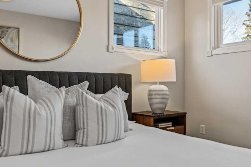 1571 Windsor Street Nw, Calgary, AB - Indoor Photo Showing Bedroom