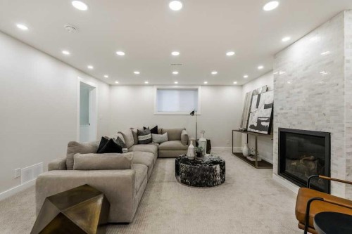 1571 Windsor Street Nw, Calgary, AB - Indoor Photo Showing Other Room With Fireplace