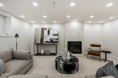 1571 Windsor Street Nw, Calgary, AB - Indoor With Fireplace