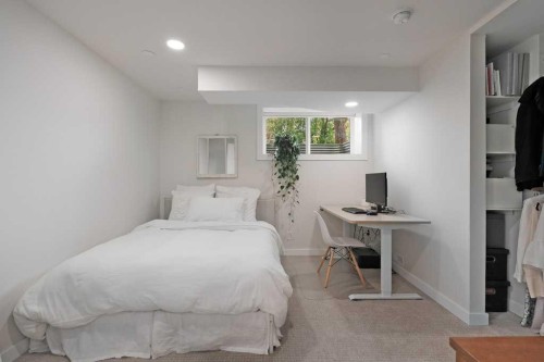 1571 Windsor Street Nw, Calgary, AB - Indoor Photo Showing Bedroom