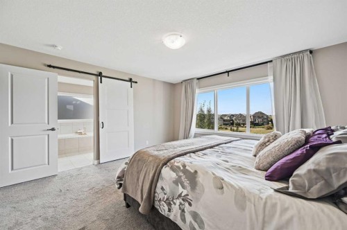 13 Cranbrook Cove Se, Calgary, AB - Indoor Photo Showing Bedroom